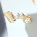 Golden earrings with Pearl Back