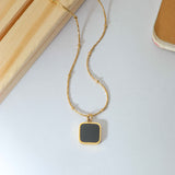 Golden Necklace with Black Stone