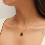 Golden Necklace with Black Stone